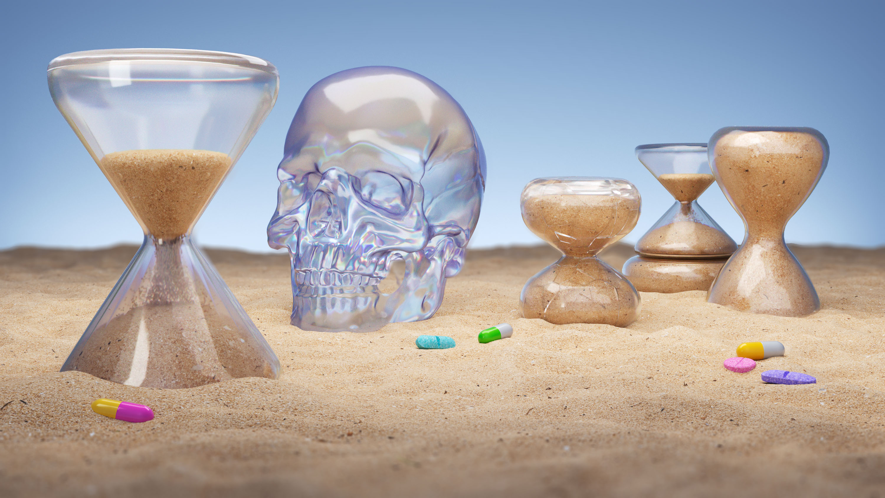 a glass skull and hourglass embedded in sand with scattered supplements